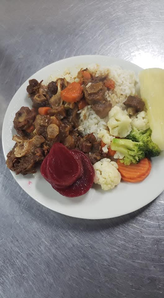 Stew mutton with white rice, vegetables and beets